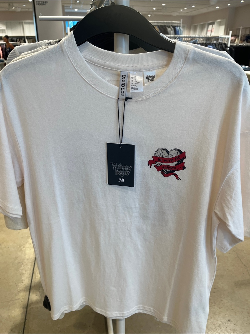 H&M White Tee with Small Red Heart Banner Graphic “Wuthering Heights Collection”